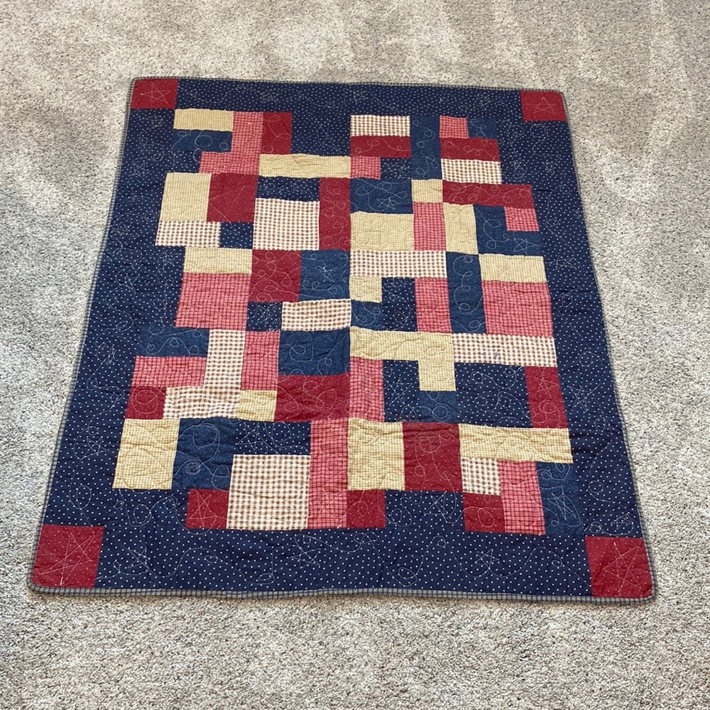 Hand crafted crib size quilt